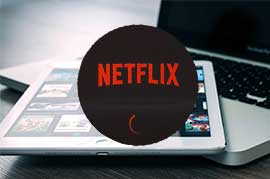 notebook y tablet con Netflix